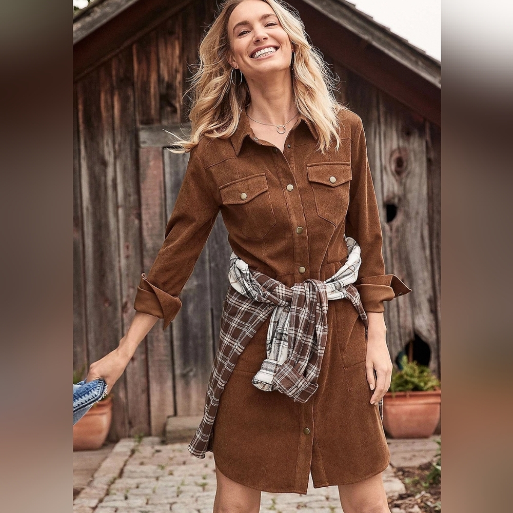 Corduroy long sleeve front snap dress.
